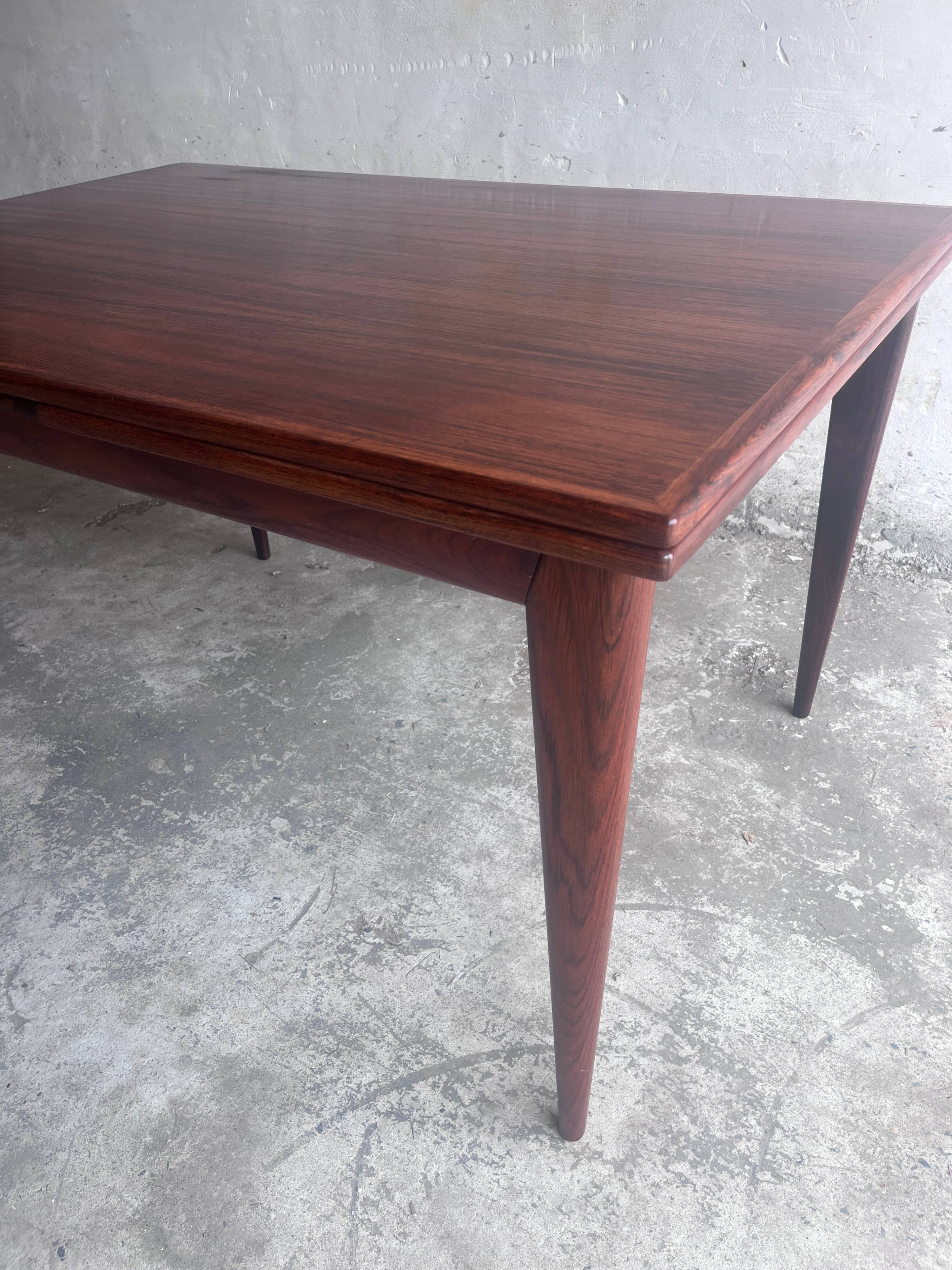 Danish extendable dining table in rosewood by Niels O. Møller, model 254, Denmark, 1960s.