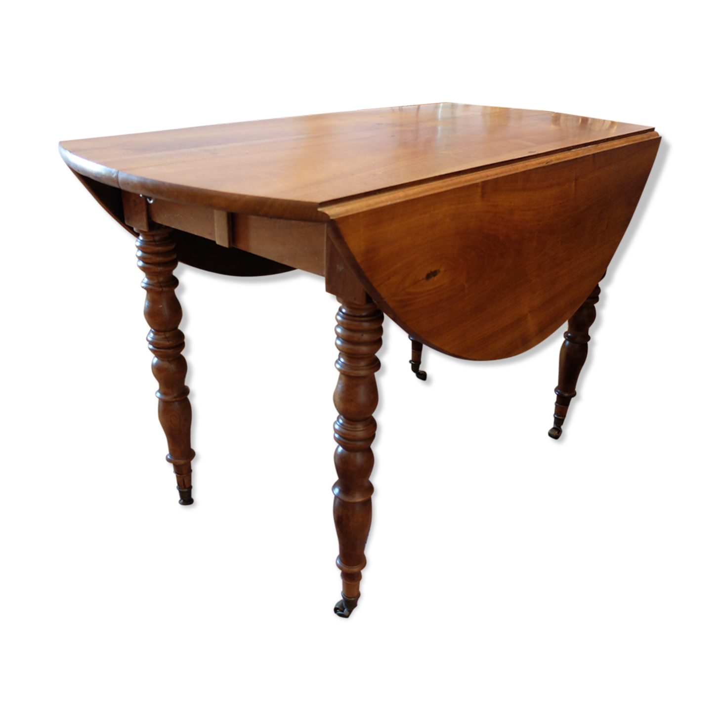 Table ovale ancienne 6 pieds sur roulette avec rallonges Louis Philippe en noyer