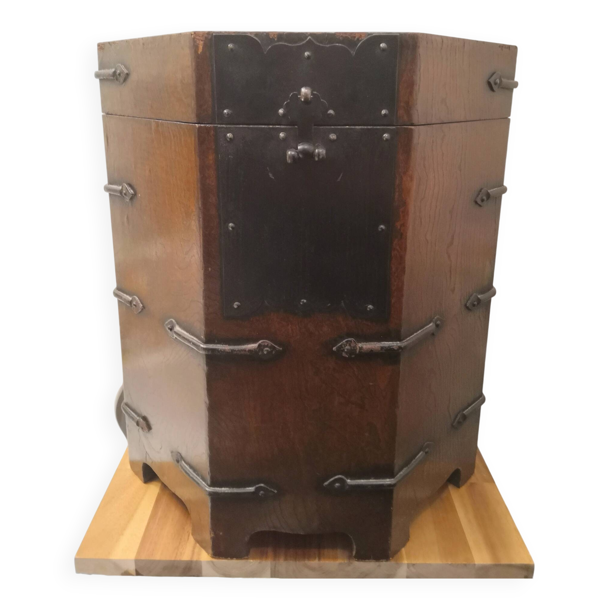 Octagonal wooden chest with metal ornaments from Asia