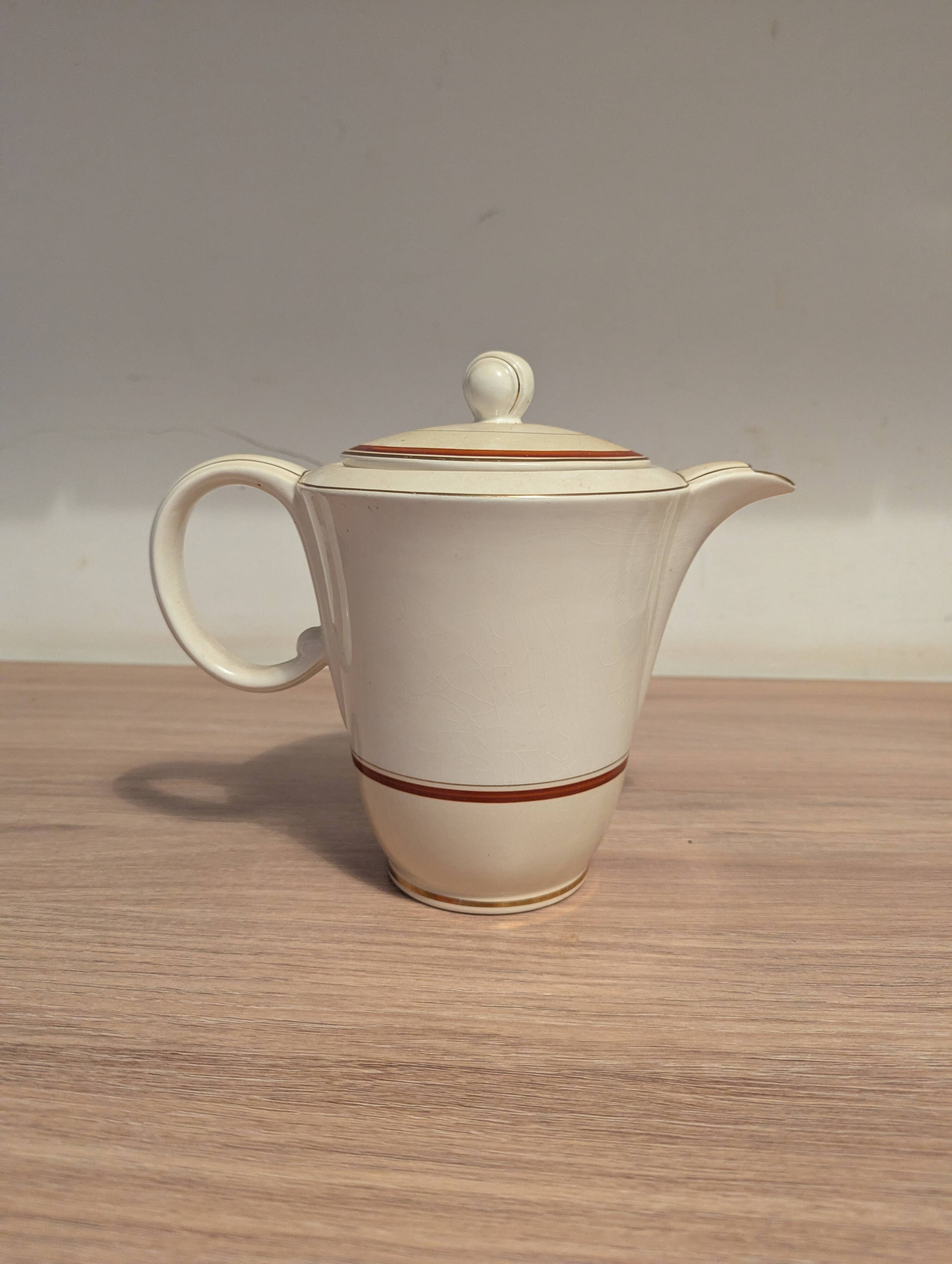 Large Longchamp set in France in earthenware Tea service, serving pieces