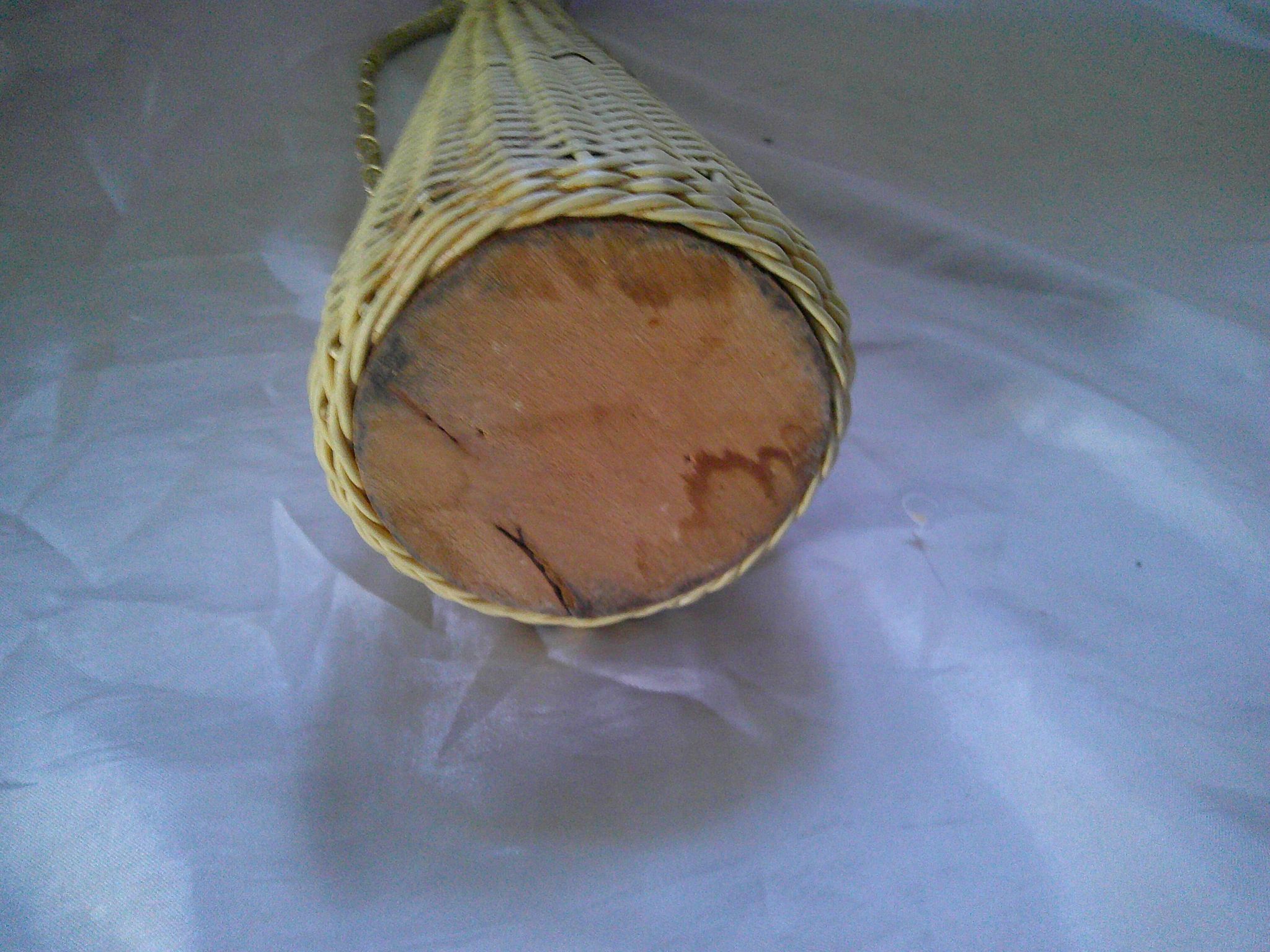 Old glass bottle - Woven wicker