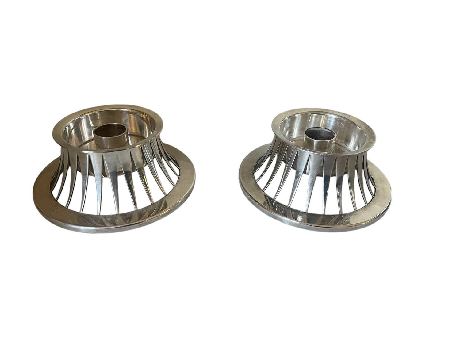 Pair of Keltum Pleet silver metal candlesticks