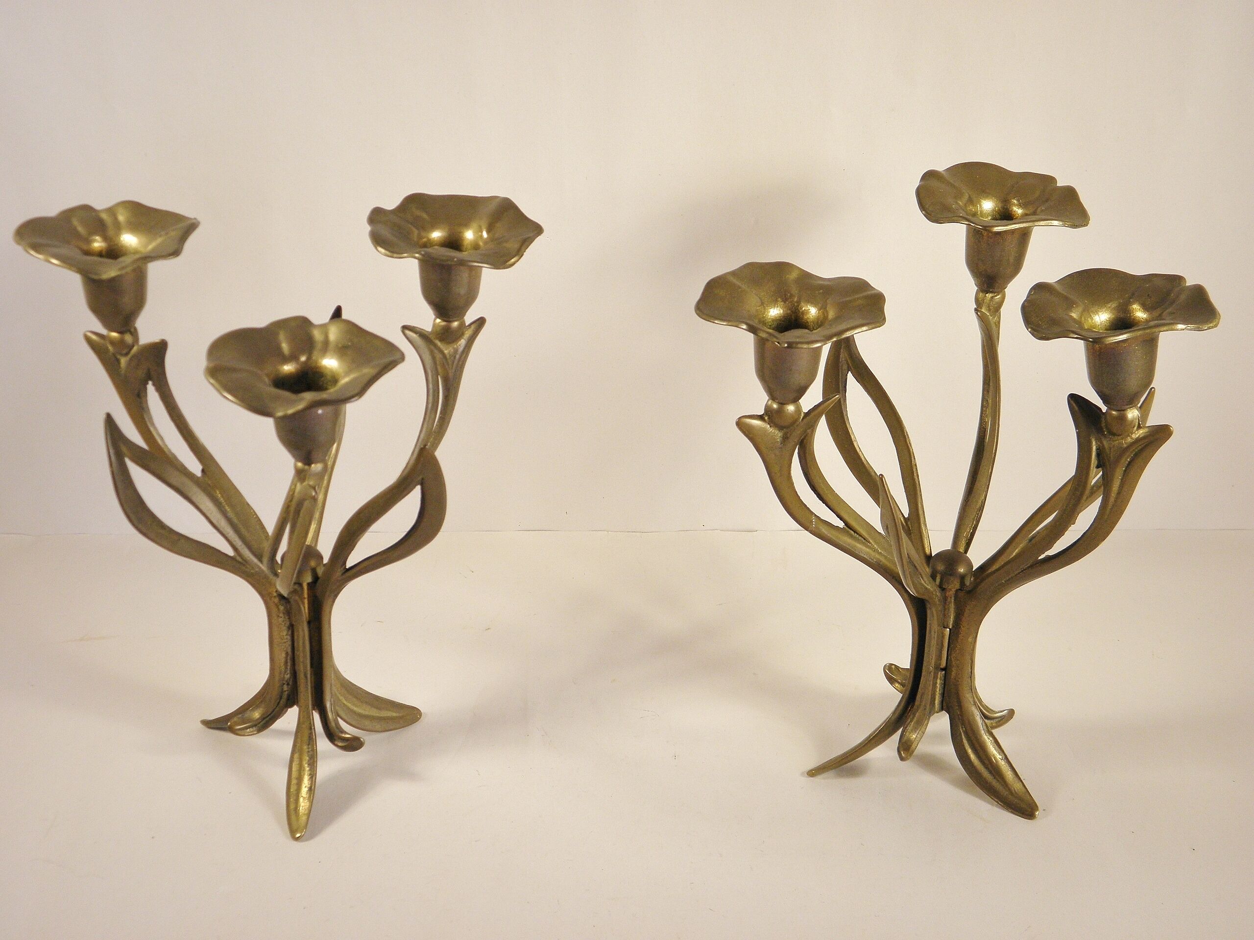 Pair of candlesticks three fires in brass