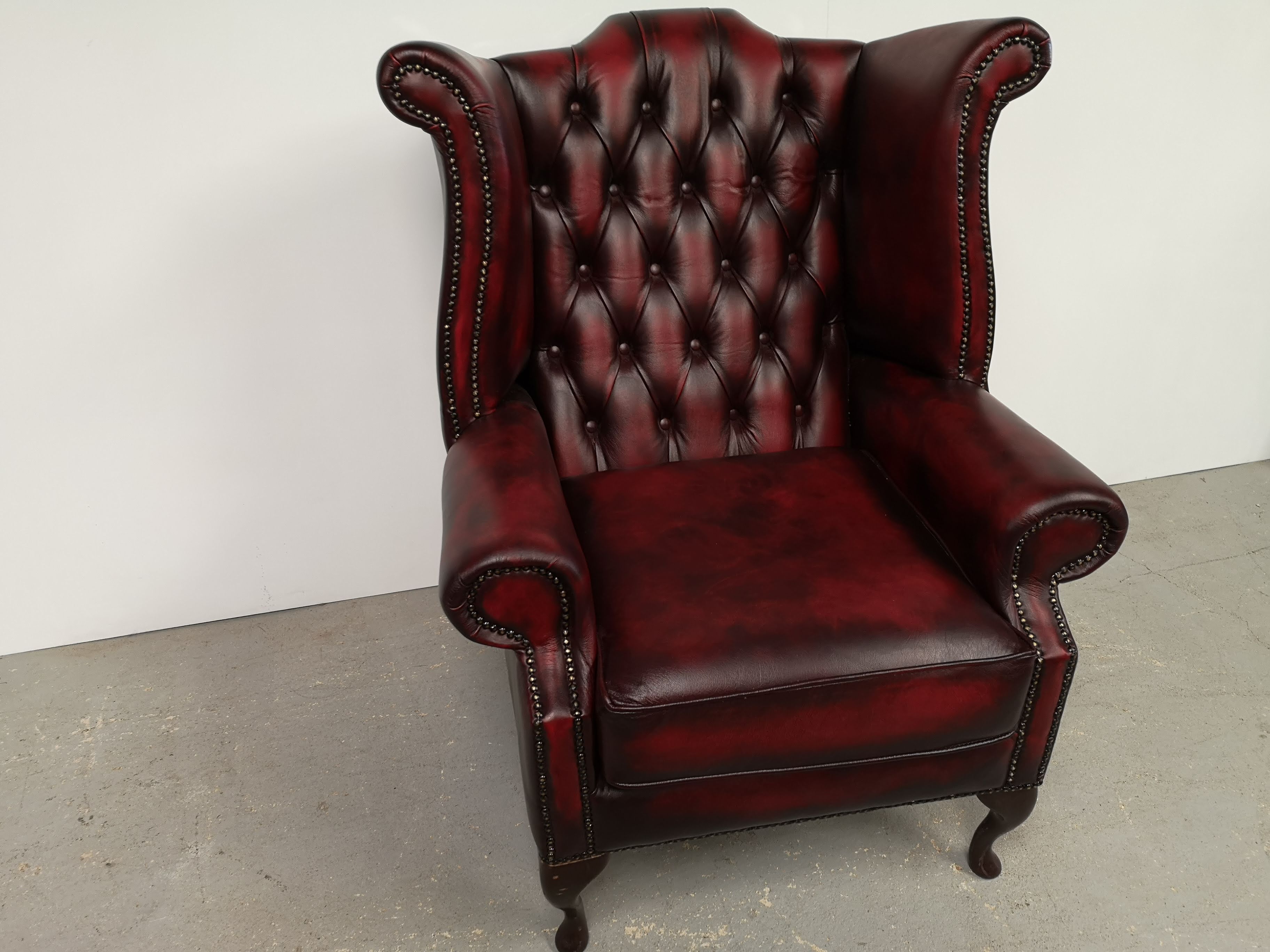 Burgundy chesterfield chair