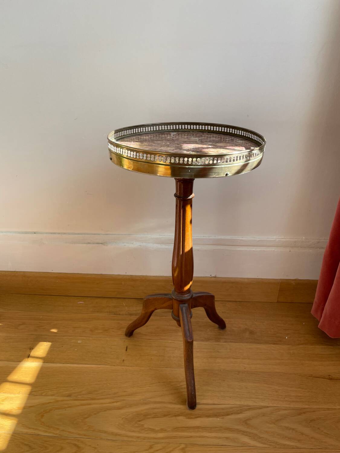 Burgundy marble pedestal table