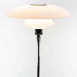 Chrome floor lamp with white lampshade