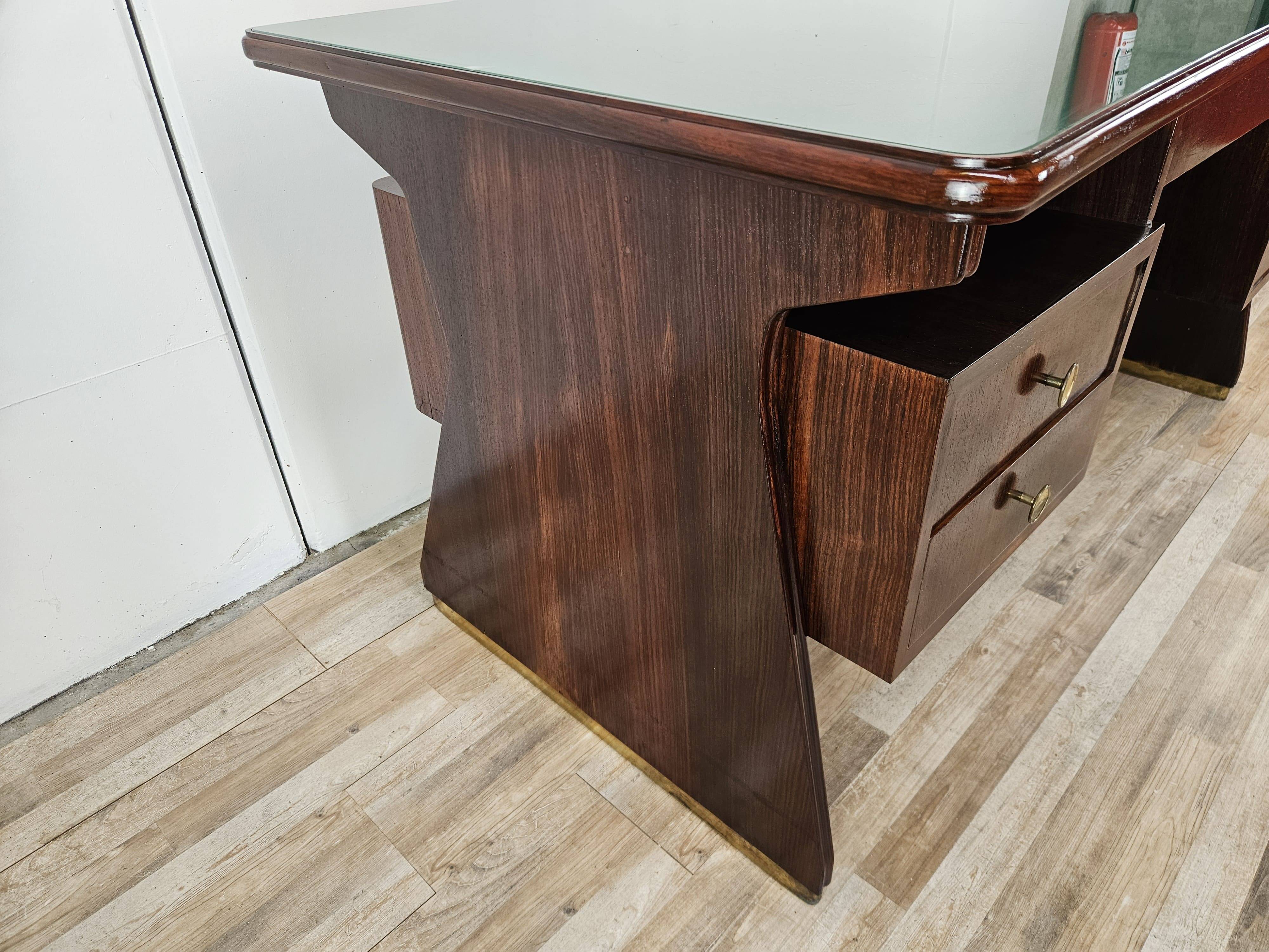 Executive Art Decò desk in exotic wood, glass, and brass