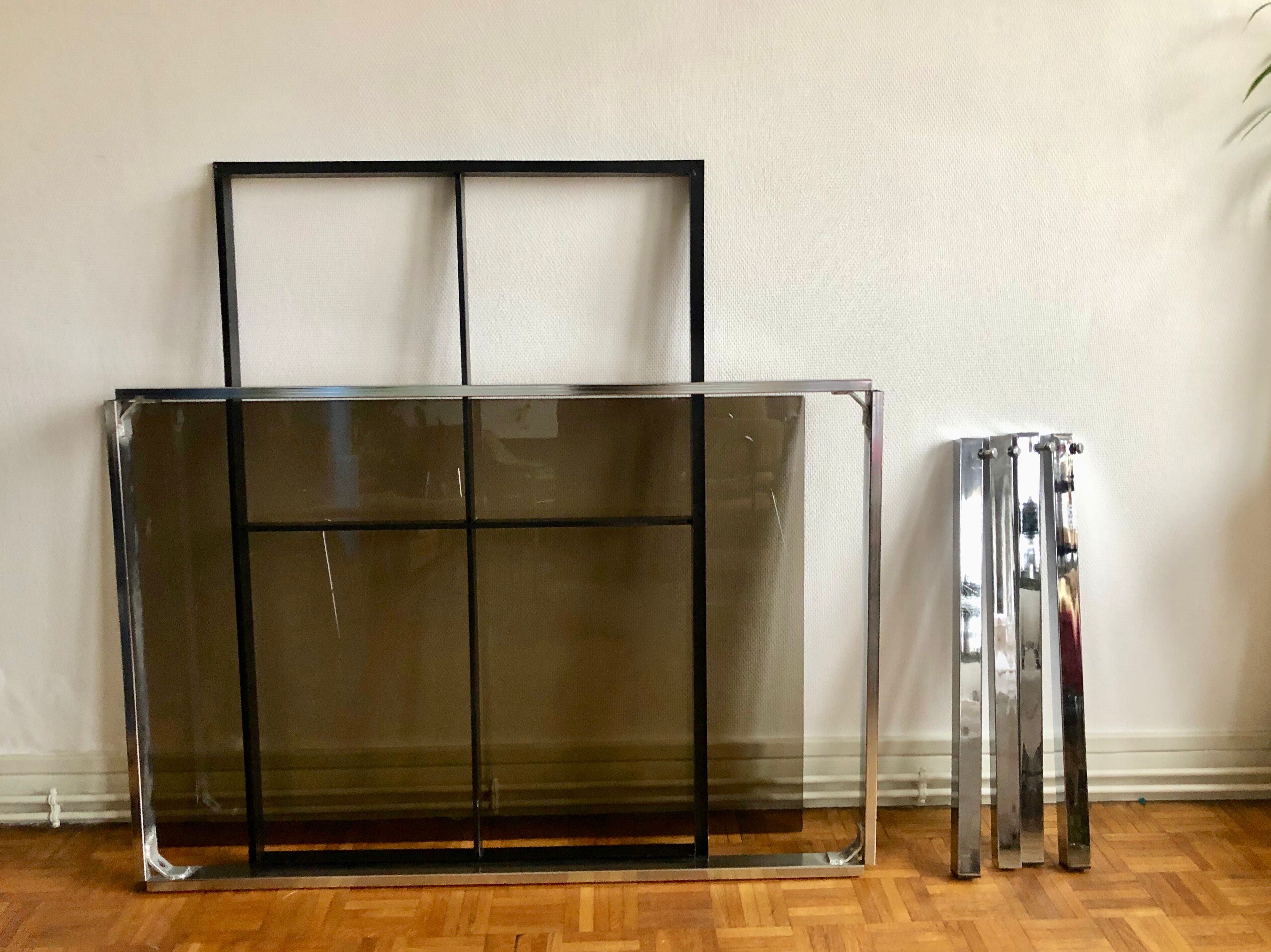 Glass and chrome metal dining table