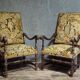 Pair of antique carved wooden armchairs – Figurative upholstery