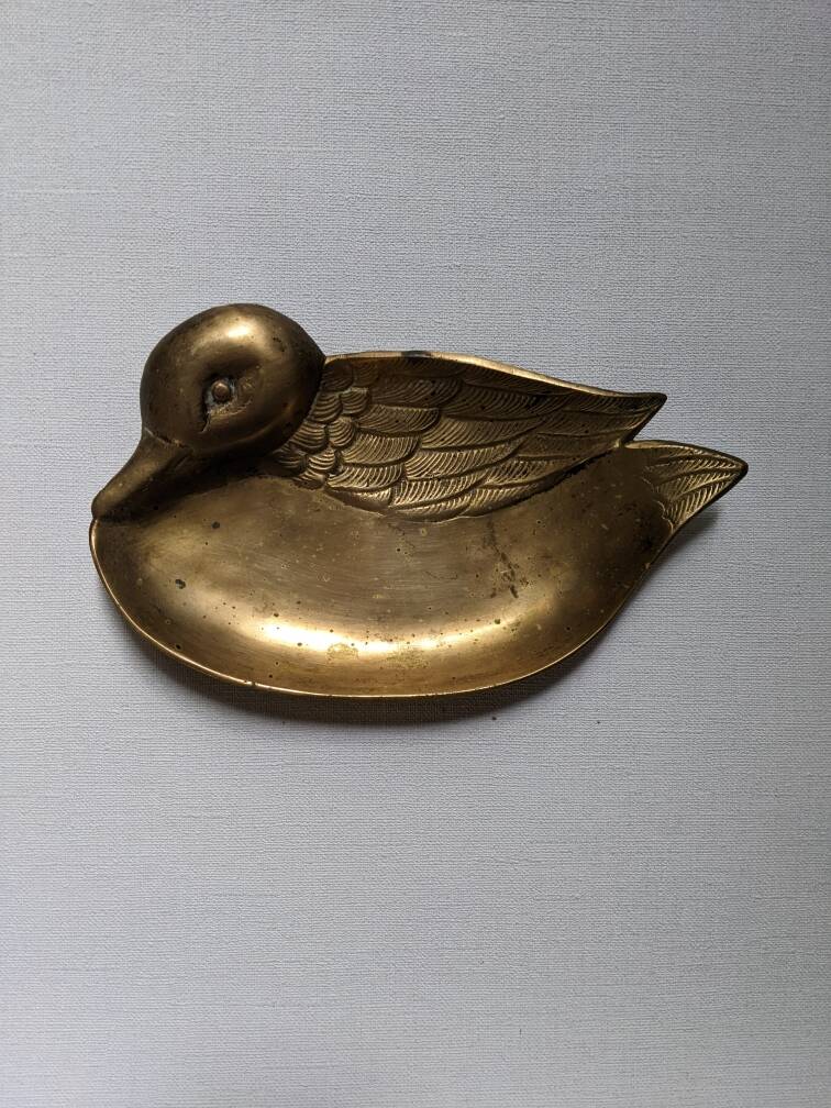 Brass duck emptier, country decorative object