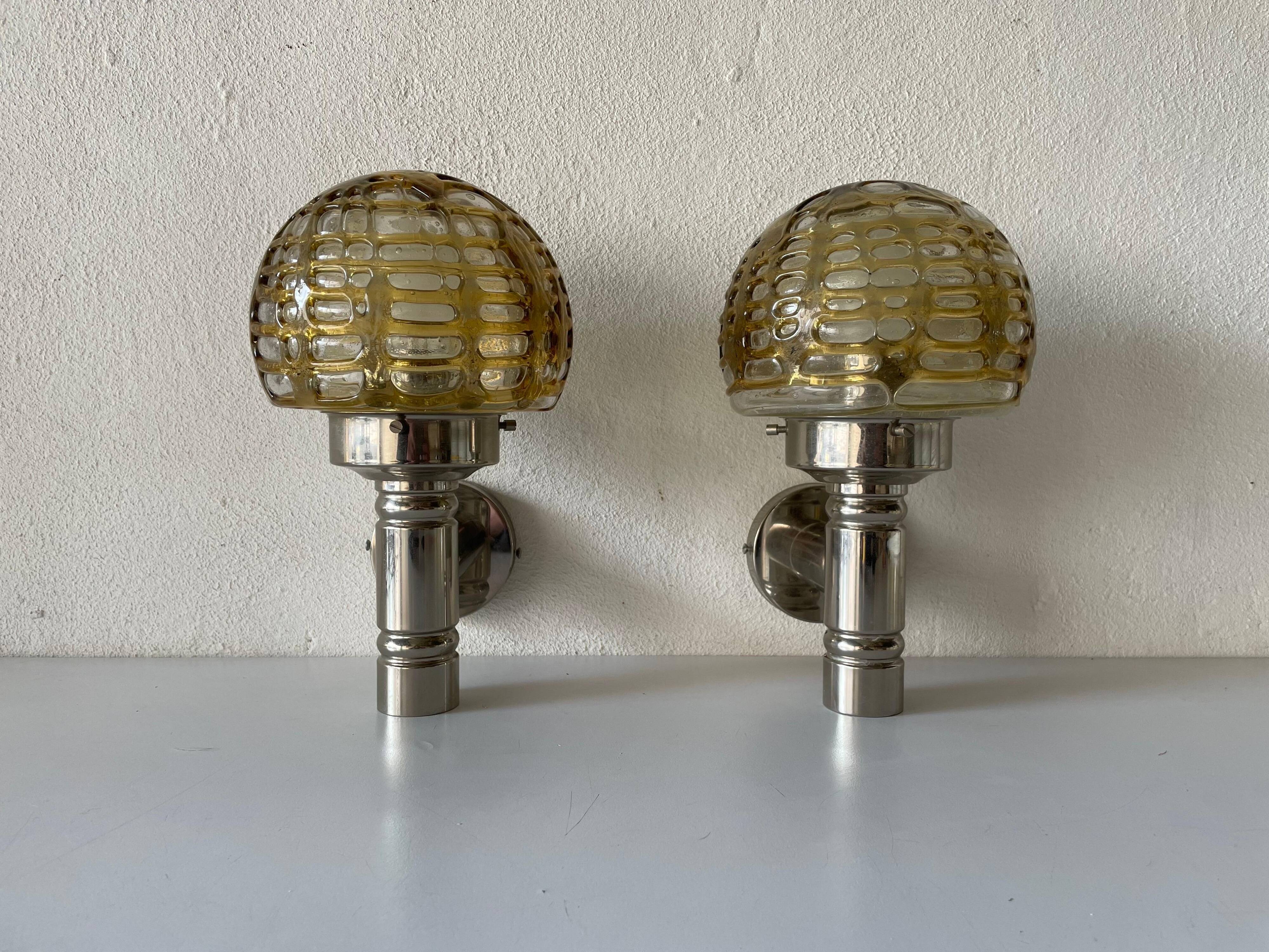 Rare pair of blown glass and chrome wall lights by Doria, 1960s, Germany.