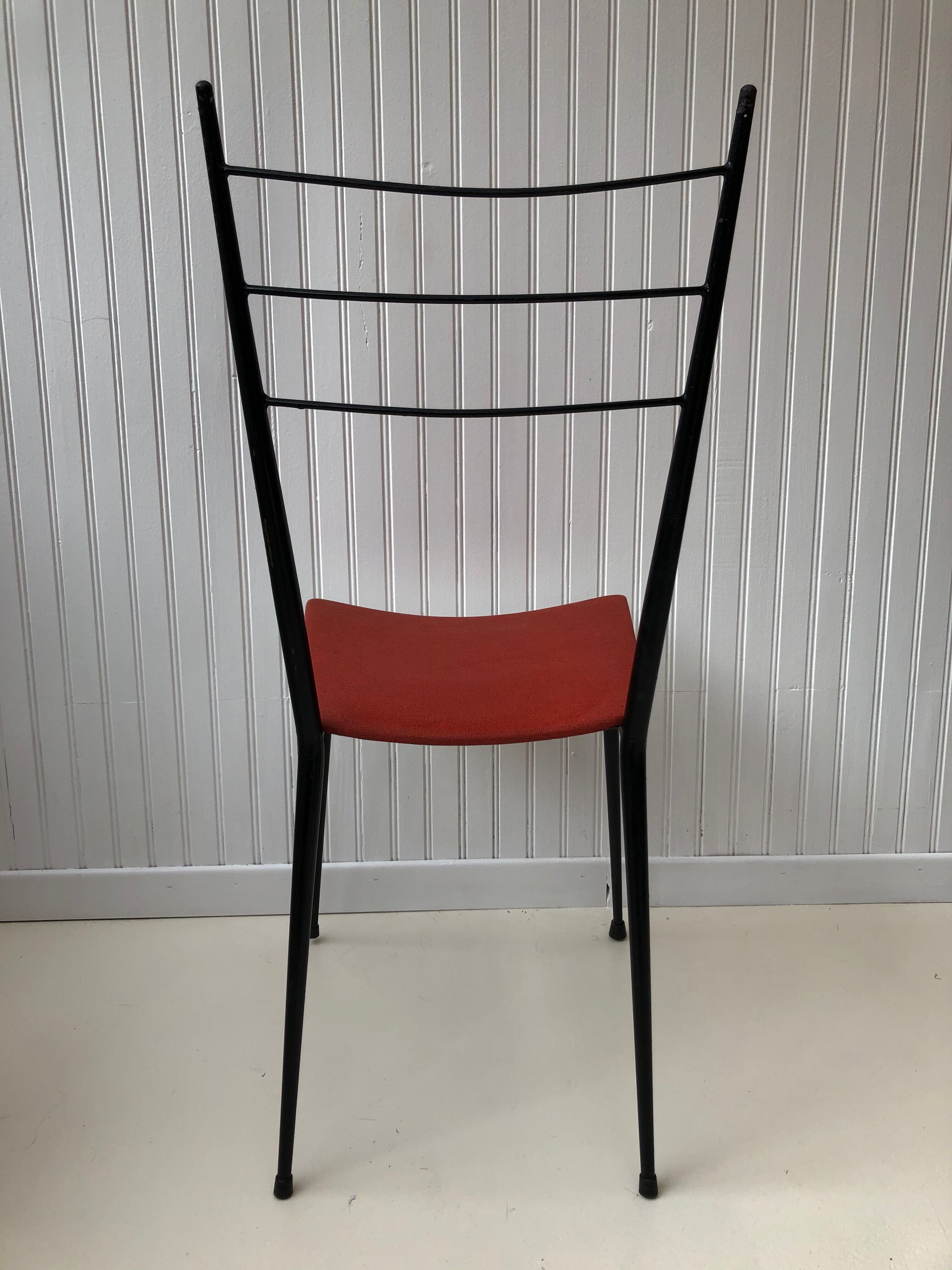 Red metal chairs from the 60s