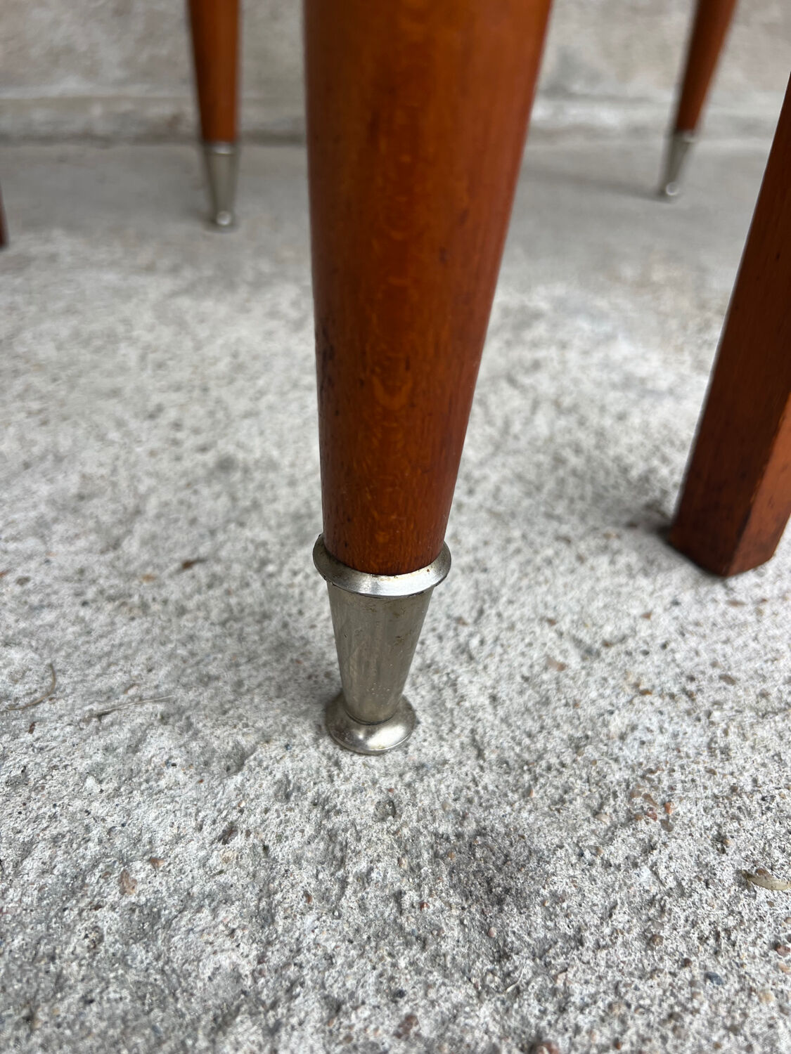 2 wooden and faux leather chairs in Scandinavian style