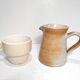 Vintage creamer in marsh sandstone