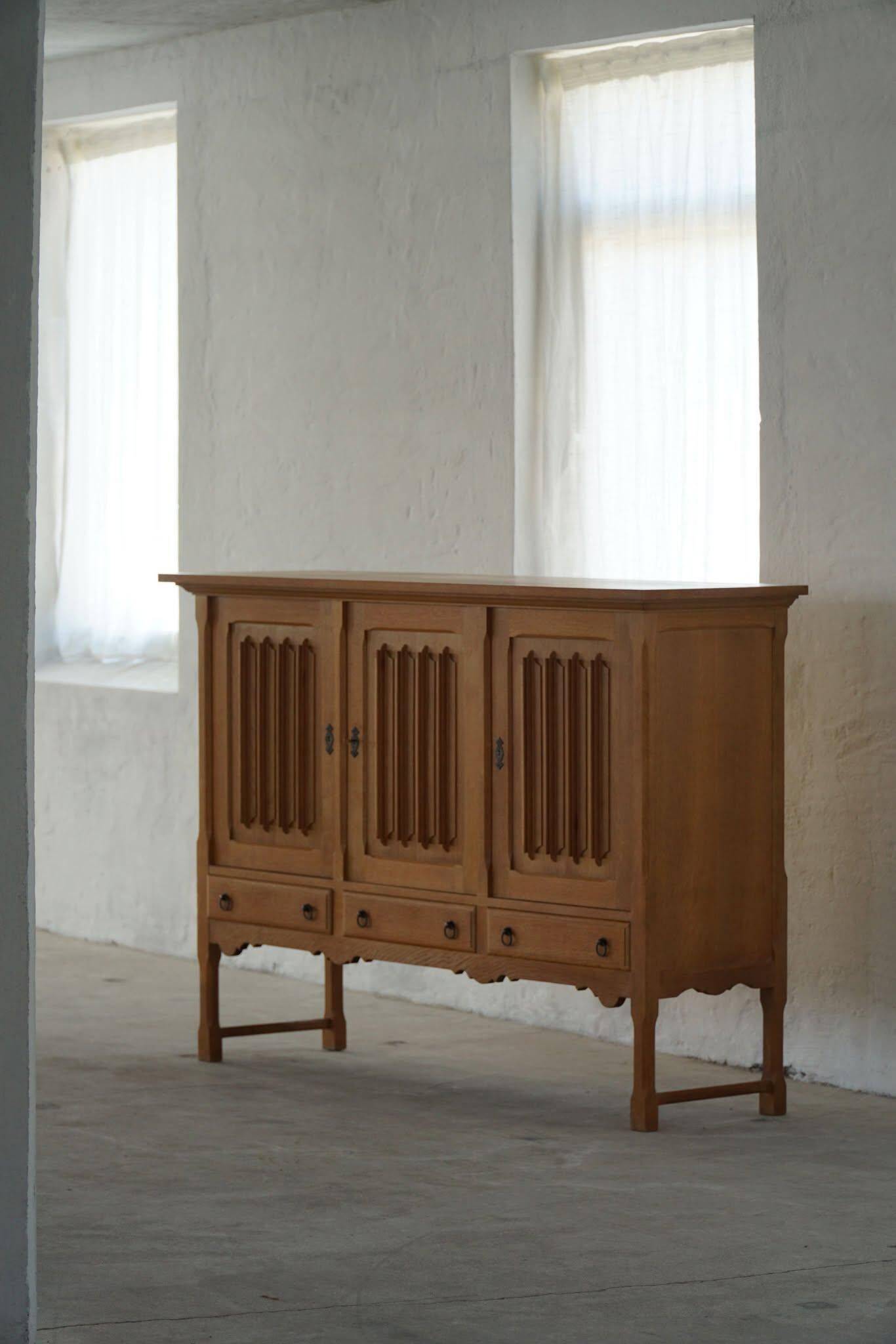 Brutalist oak sideboard, mid-century Danish design, Kjærnulf style, 1960s.