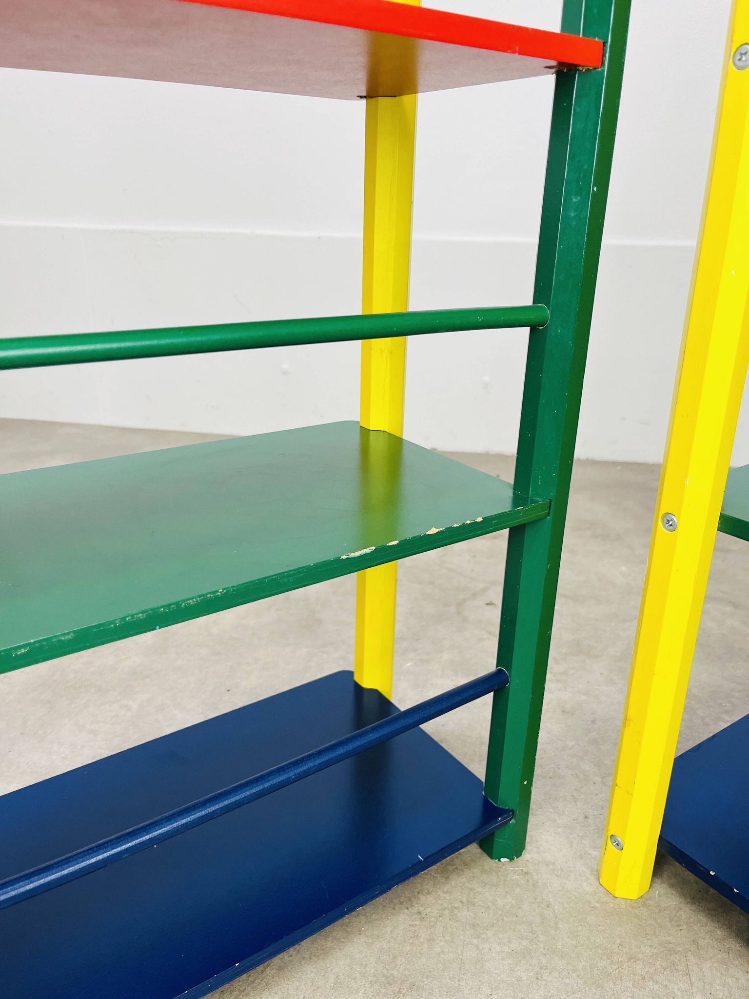 Pair of pencil-style shelves by Pierre Sala for children.