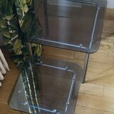 pair of smoked glass nesting tables