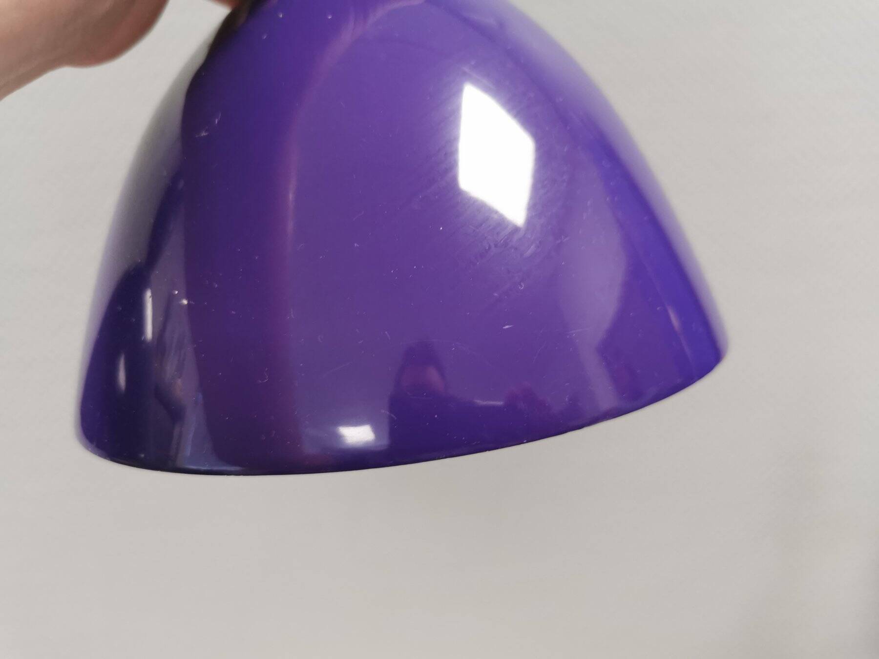 Two purple hanging lamps from Norway Says for Muuto, model Mhy