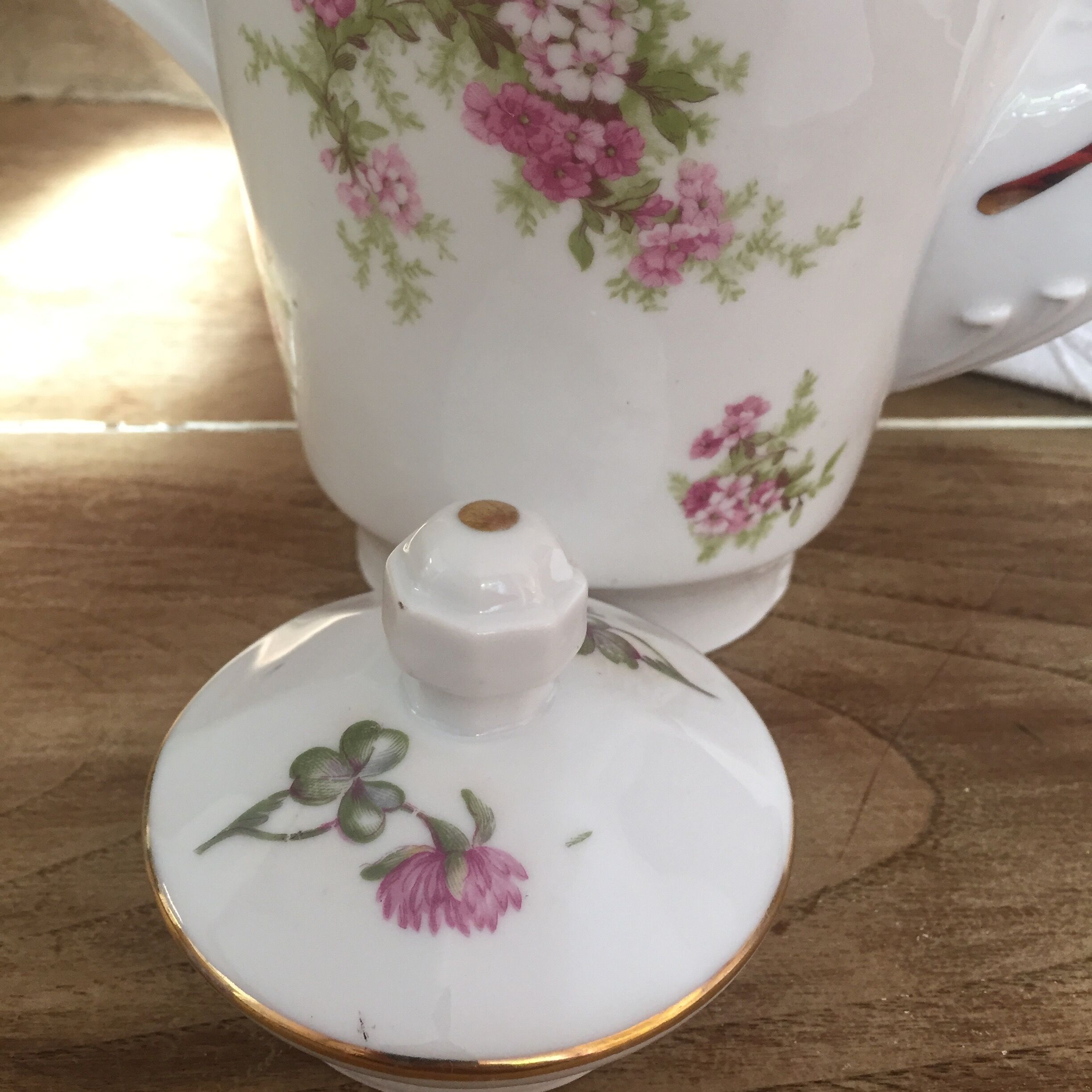 Old porcelain tea and coffee maker