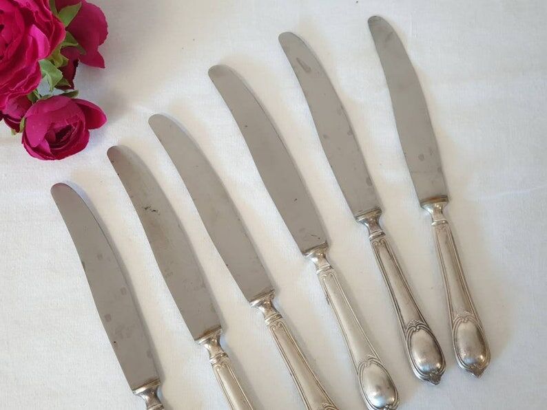 Large antique X6 knives made of silver metal