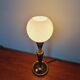 Black lacquered metal table lamp with satin white glass, 1950s.