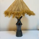 Black glazed ceramic lamp in the shape of a woman attributed to Jacques Bli