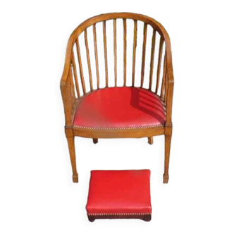 Red leather armchair and footrest