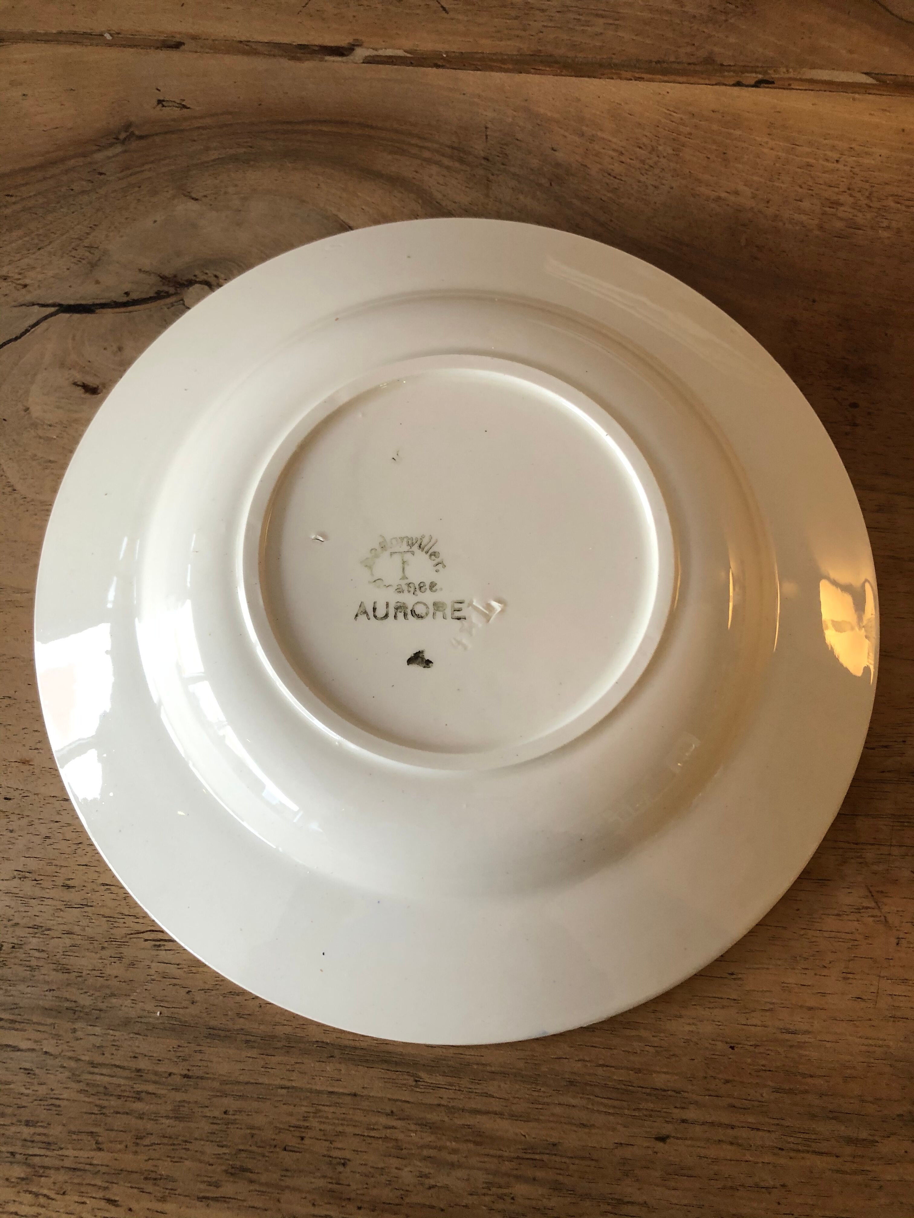 4 hollow plates made of ancient earthenware
