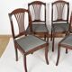 Ensemble de 4 chaises tapissées de style Art Déco pour salle à manger.