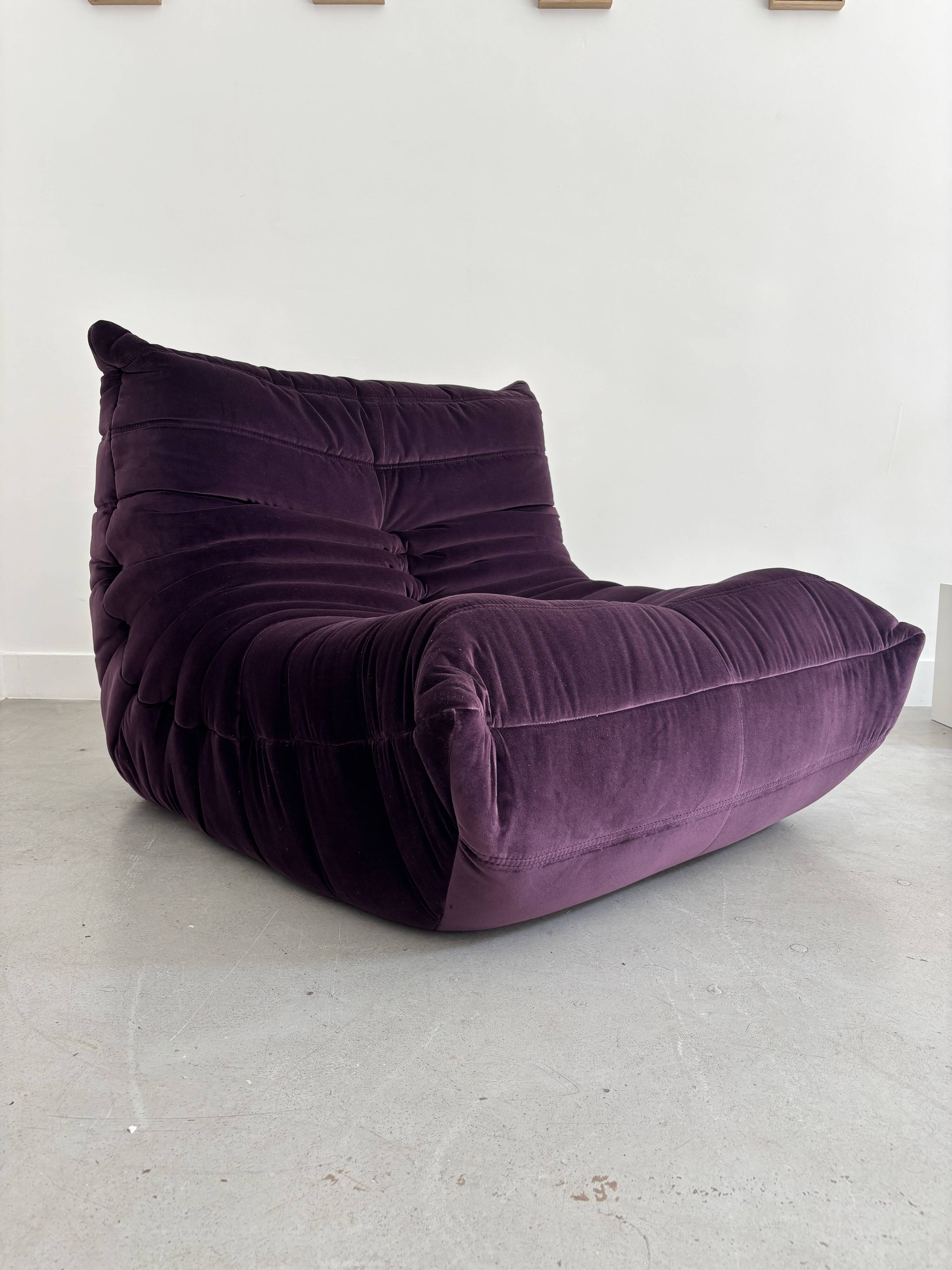 Purple "Togo" armchair by Michel Ducaroy