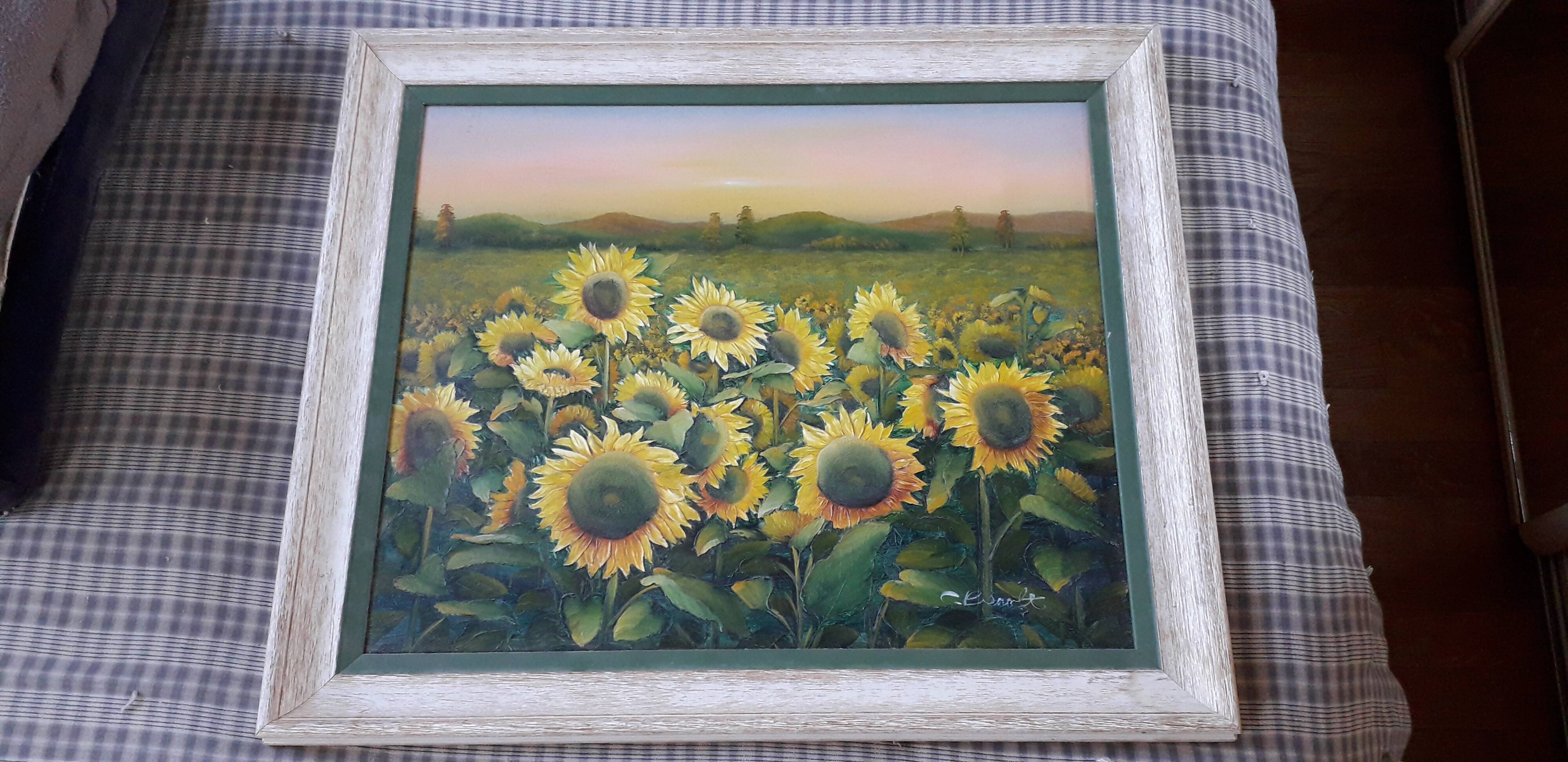 Vintage oil painting depicting a sunflower landscape