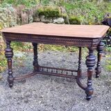 Table from the late 19th century, neo-Renaissance style, in black and oak.