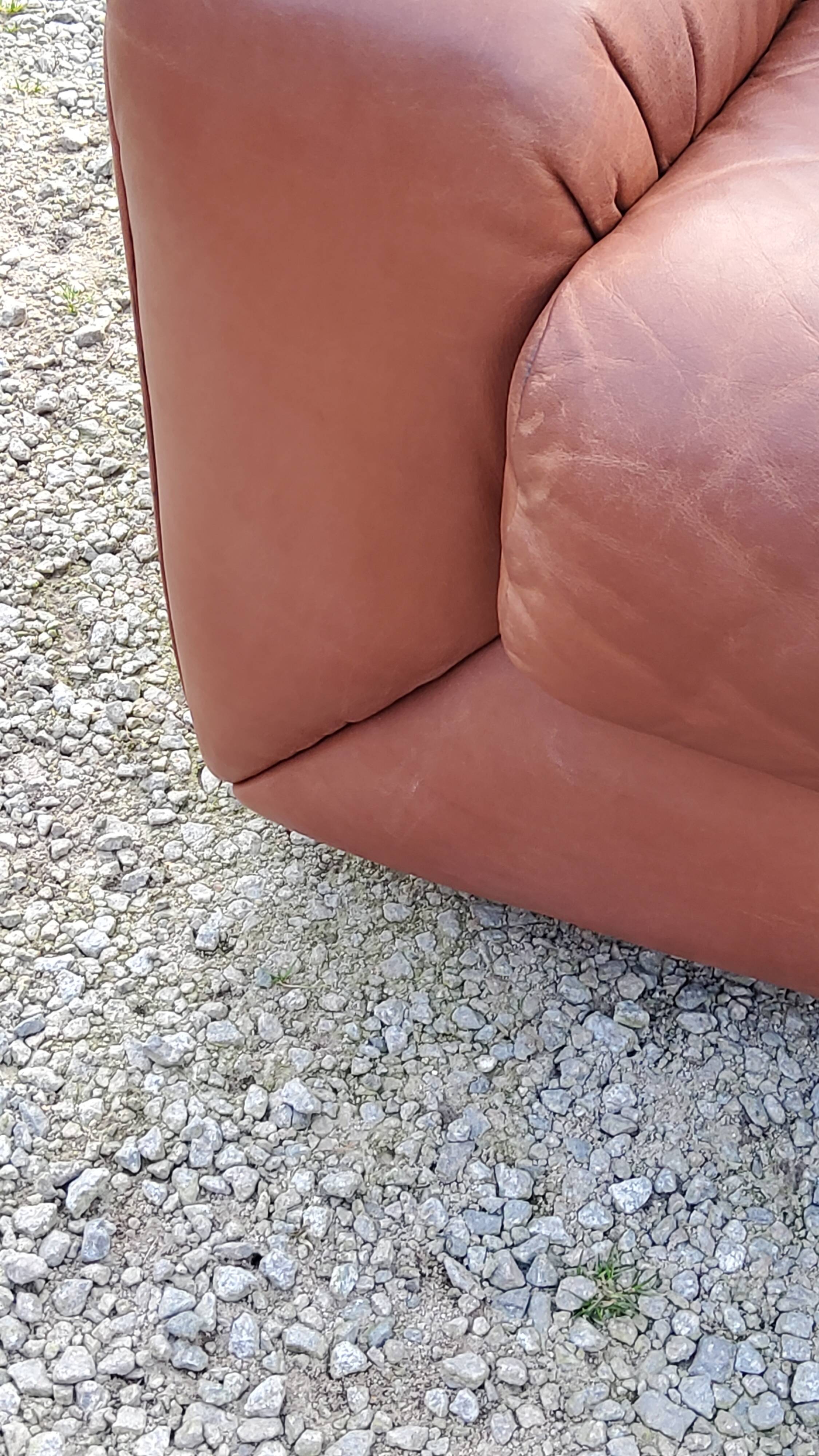 Pair of armchairs and De Sede sofa in cognac leather from the 70s/80s