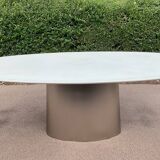 Oval designer dining table in frosted glass and brushed stainless steel