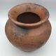 Vase or pot in brown terracotta with artistic decoration of fish.