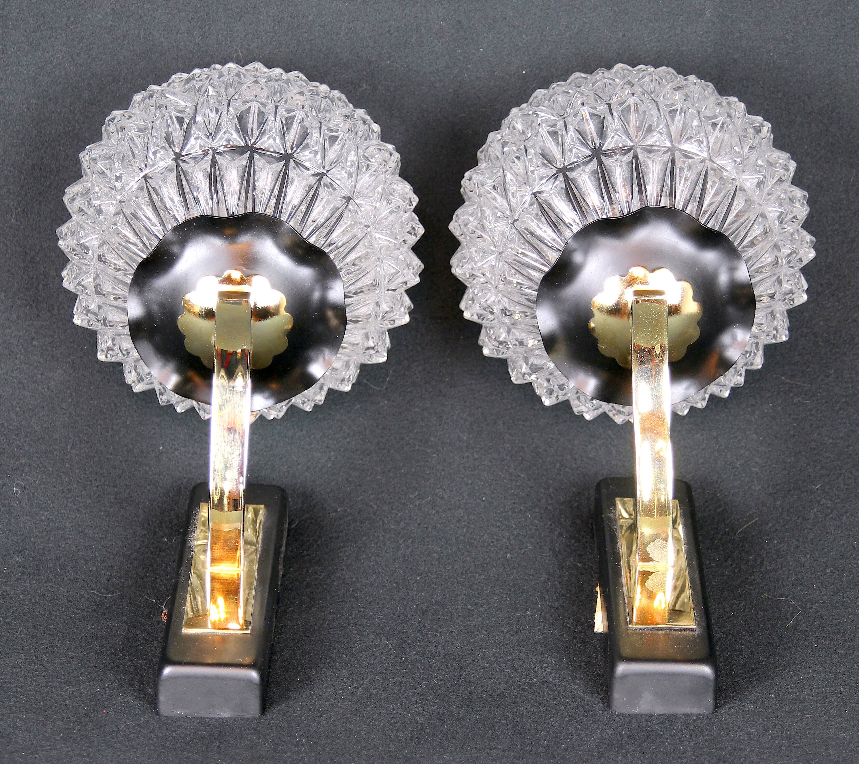 Maison Arlus Pair of brass and black wall sconces, France Mid-Century