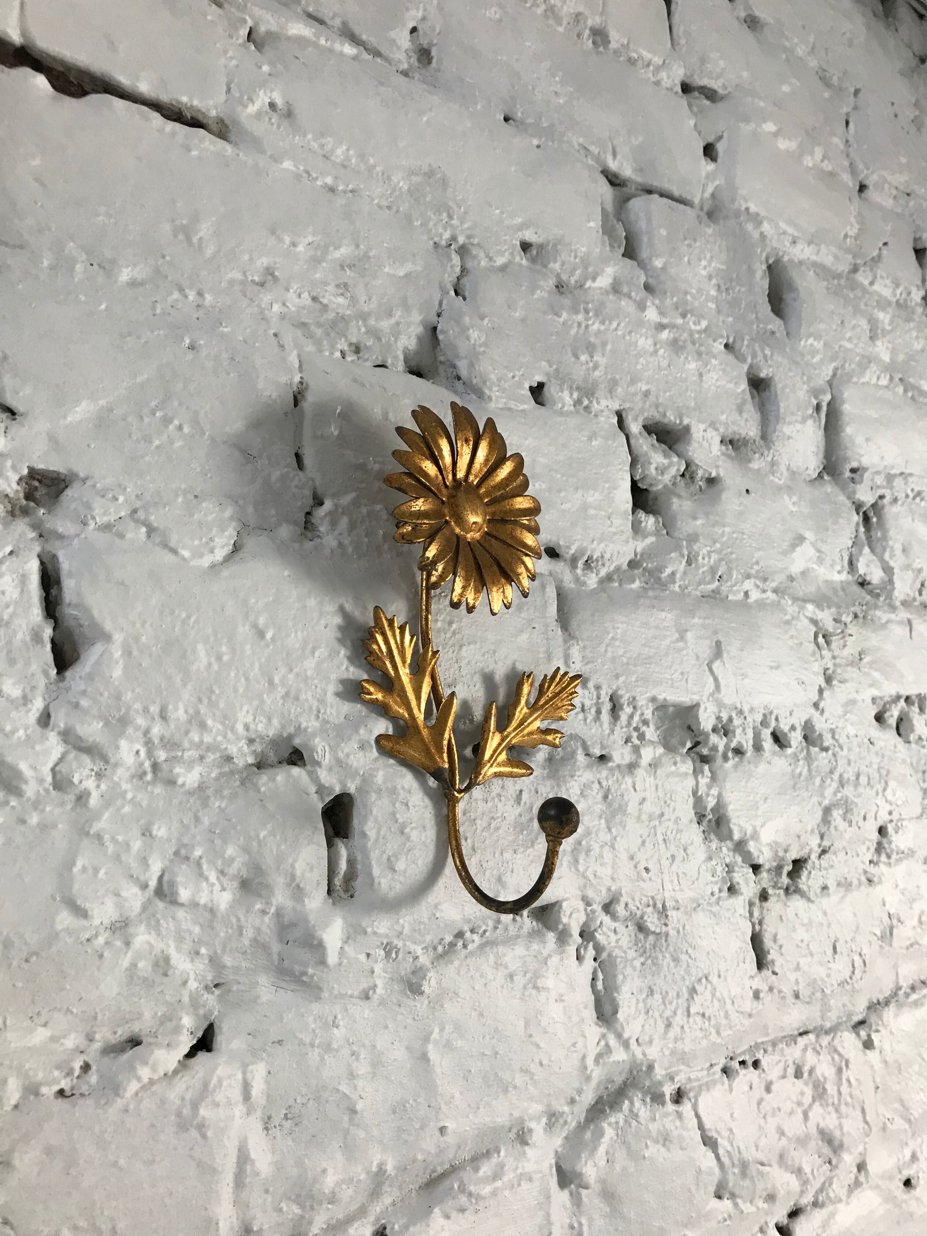 Brass flower patère