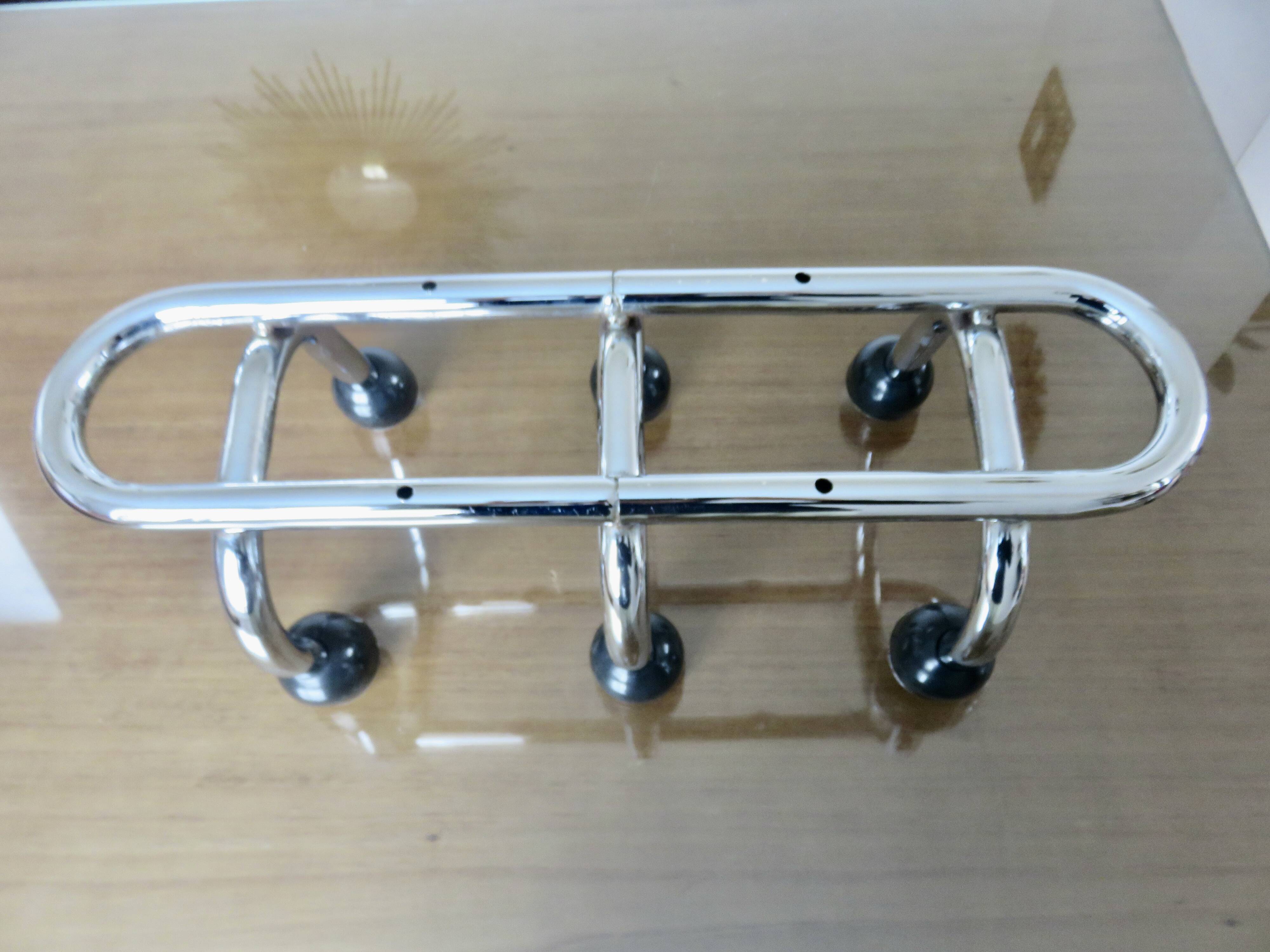 Streamlined coat rack, rockabilly, in chrome metal and bakelite 1970