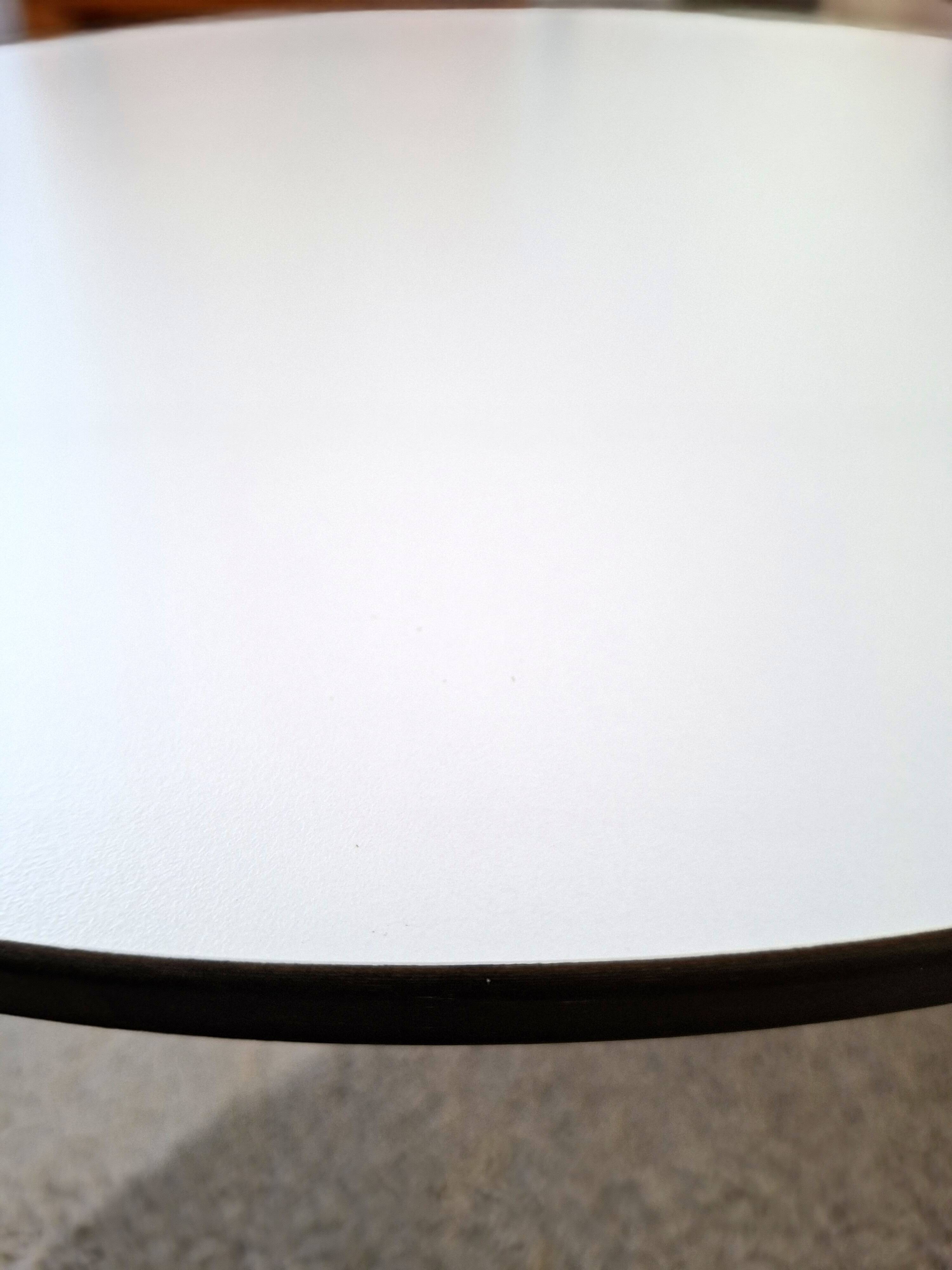 Table with orange slice by Paulin Artifort.