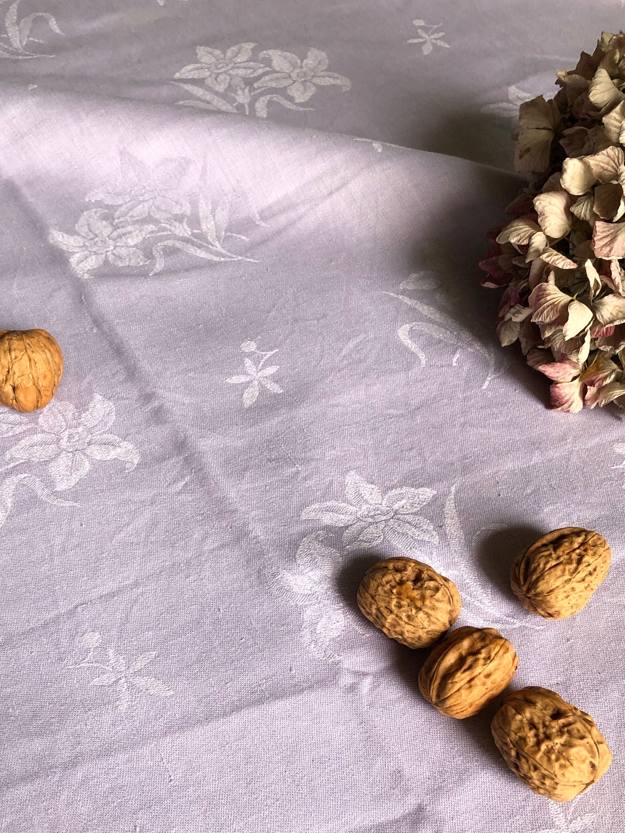 Old linen tablecloth and lilac-tinted silk