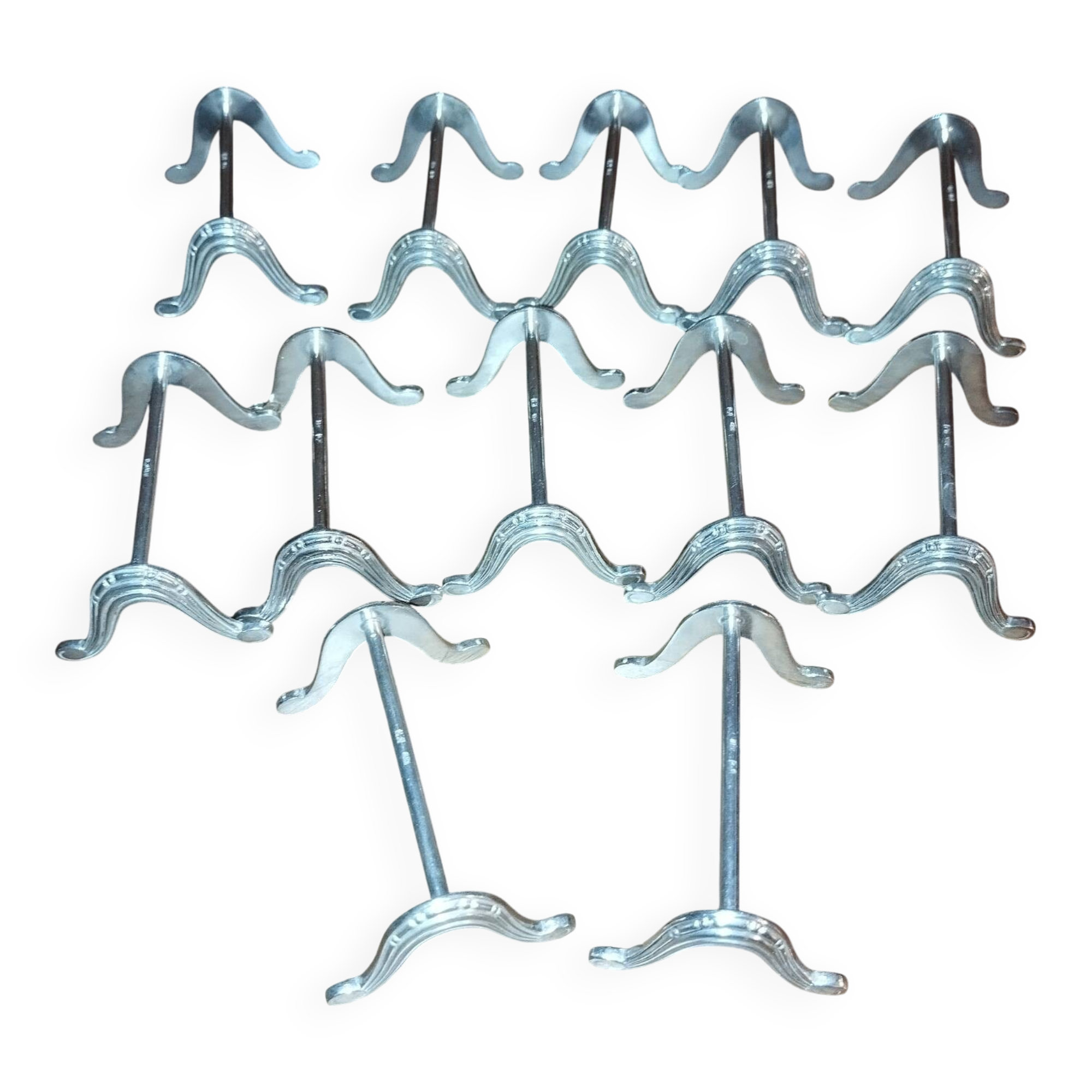 12 Art Deco silver-plated knife rests