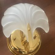 Pair of vintage polished glass shell sconces