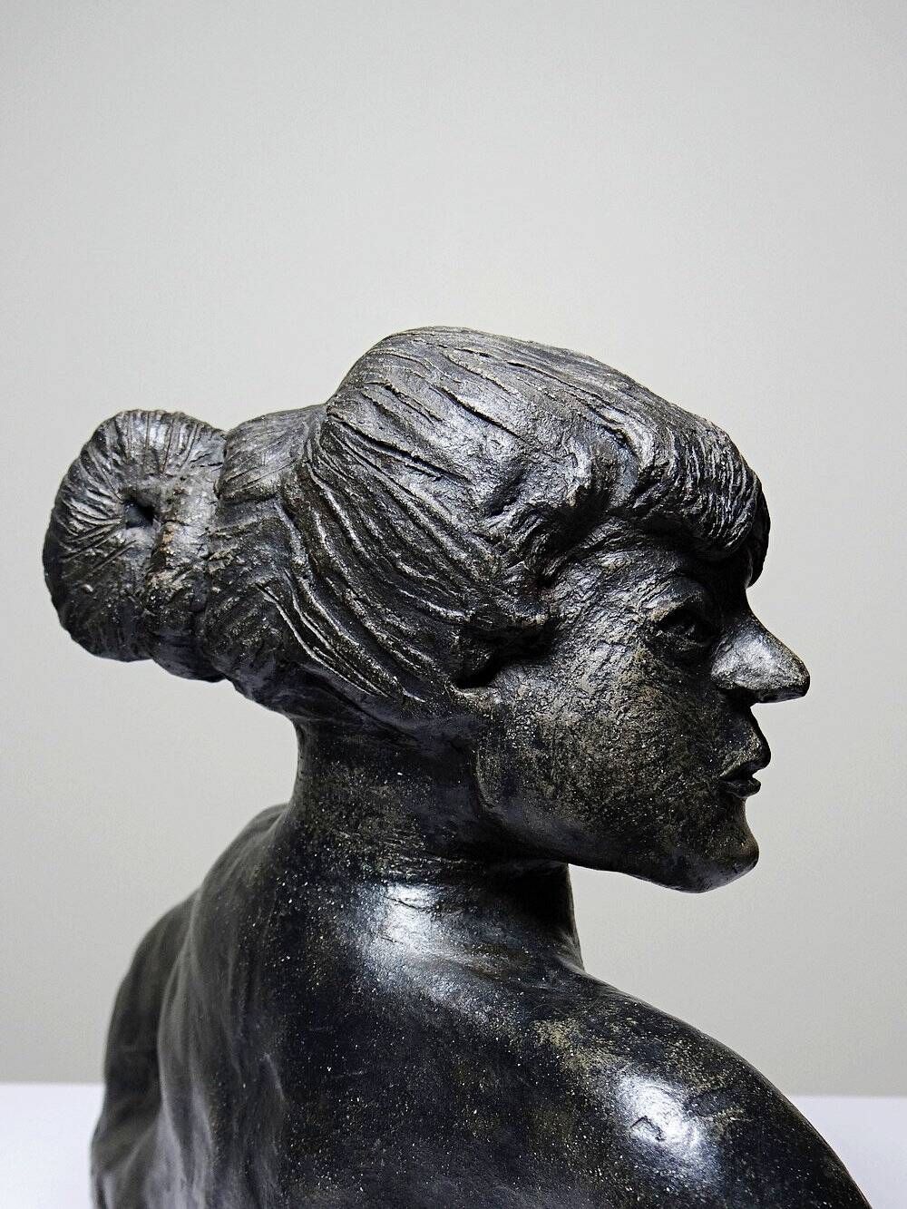 20th-century ceramic bust of a woman, an unidentified piece of art.