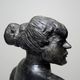 20th-century ceramic bust of a woman, an unidentified piece of art.
