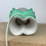 Green ceramic hand lamp and glass globe