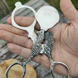 Set of two pairs of antique eggcutter scissors
