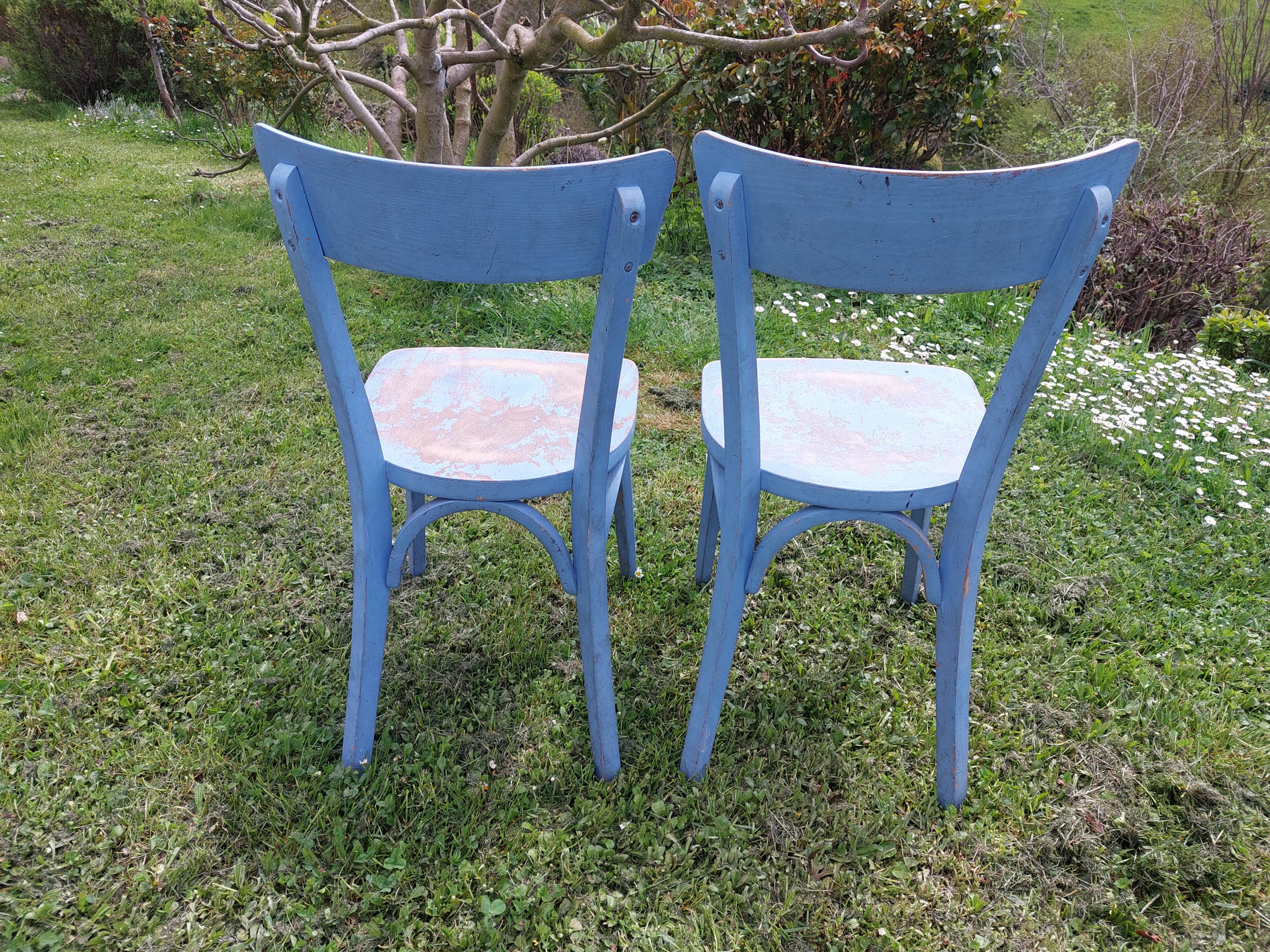 pair of chippy blue paint bistro chairs