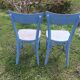 pair of chippy blue paint bistro chairs
