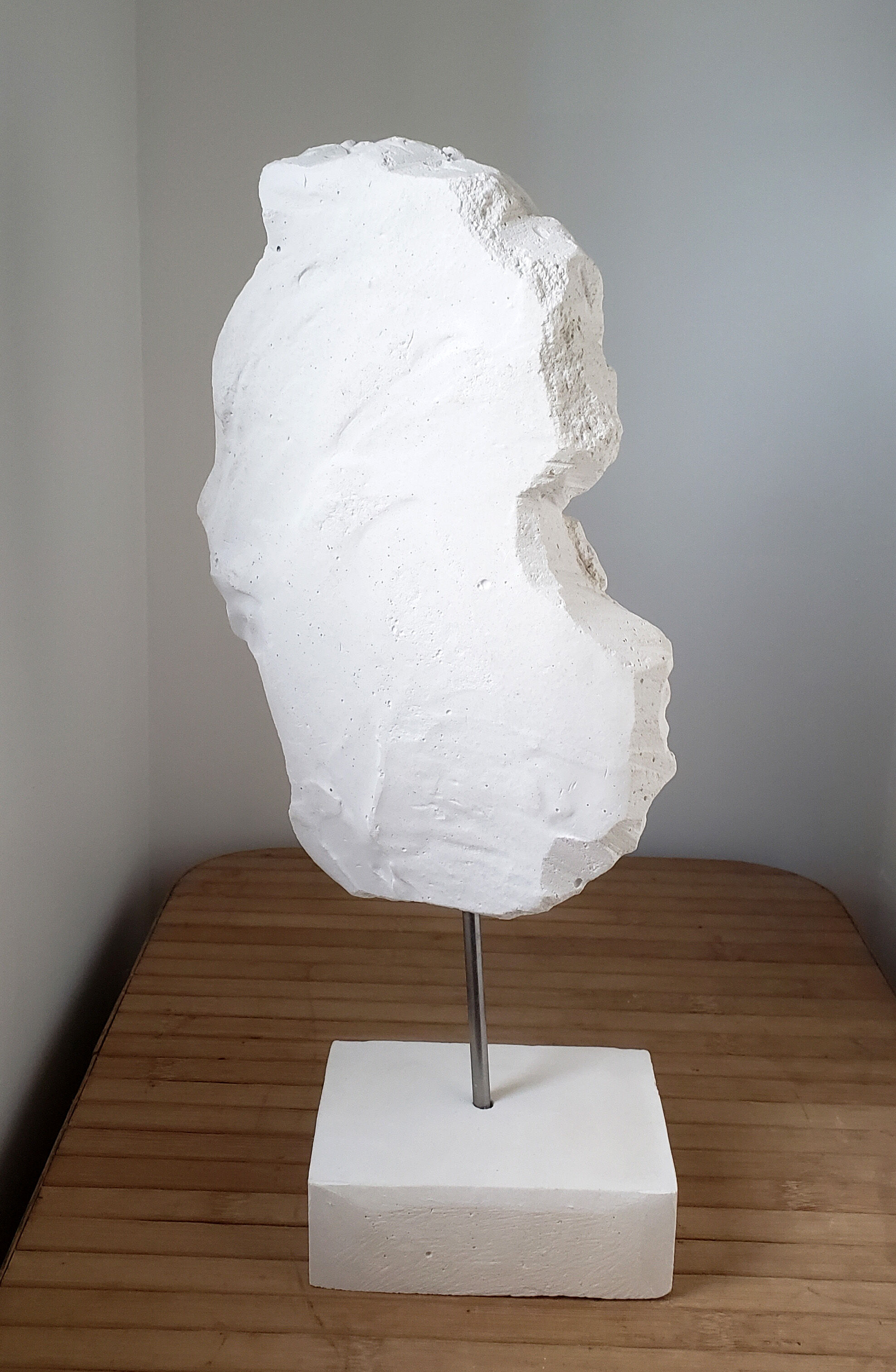 Young woman's head in plaster