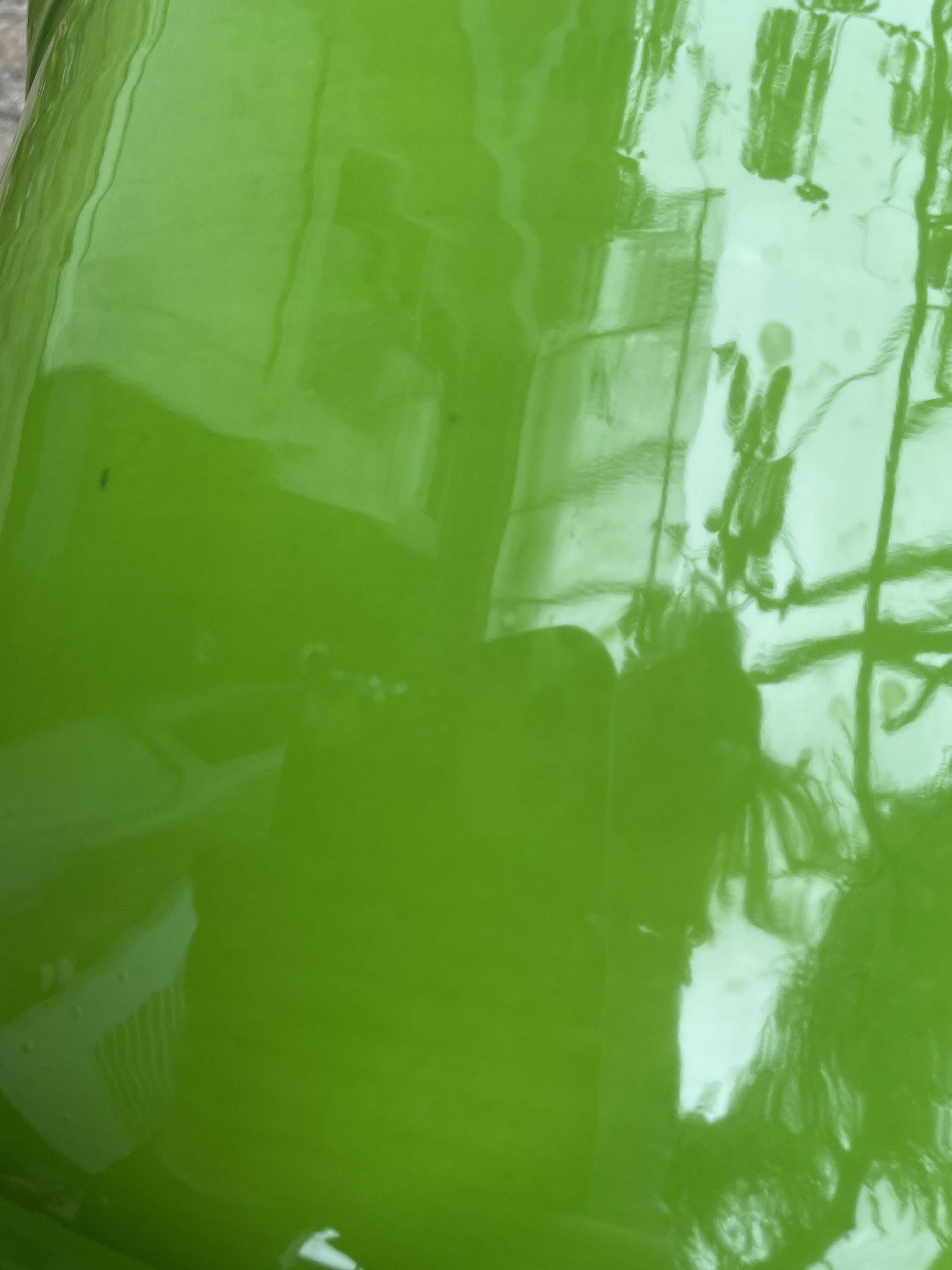 Glazed green pot cover in the style of Moreau Bourg earthenware